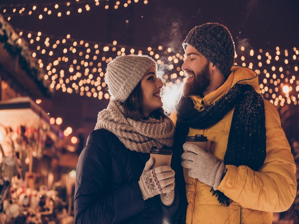 Happy couple in winter clothes