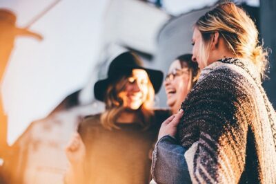 Three woman having a fun talk